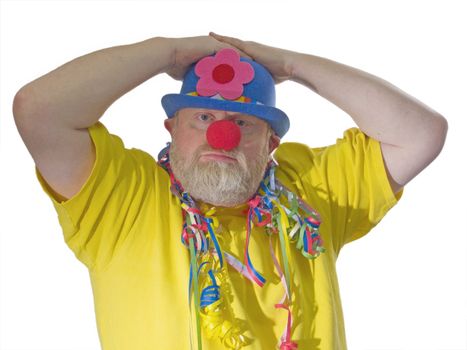 Clown with yellow shirt, blue hat and false nose