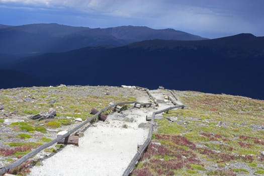 Roads in Cordeliers surrounded by colorful mountains prairies forests and tundra