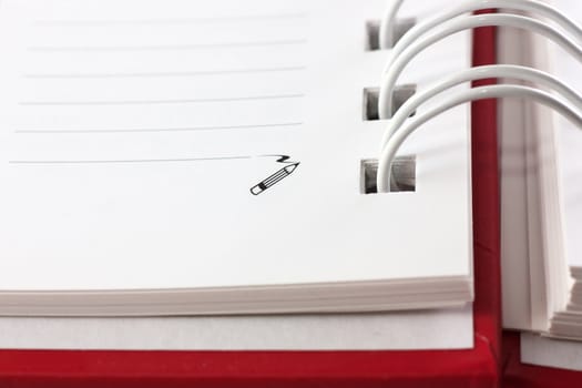 Macro view of blank spiral notebook.