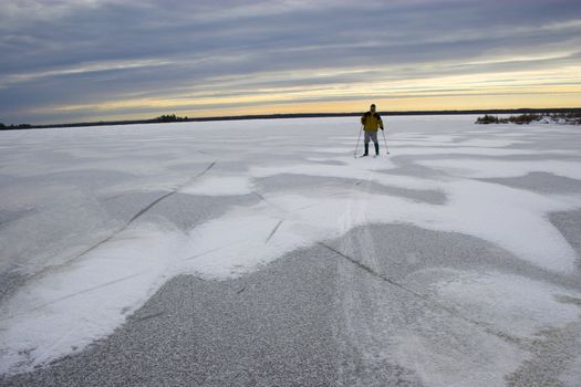 Cross-country winter skiing on the lake�s ice in Voyager National Park