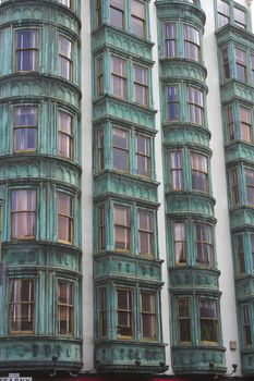 Fragment of green rusty building in San Francisco, California