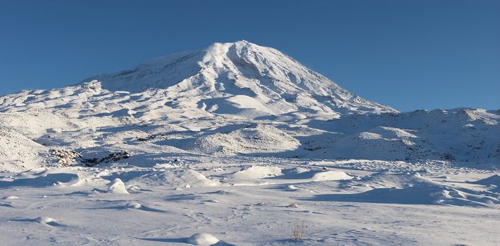 Mount Ararat (Agri Dagi) in winter. Panorama was shot from abandoned Elikoy village, altitude 2250m. Mount Ararat is an inactive volcano located near Iranian and Armenian borders and the tallest peak in Turkey.