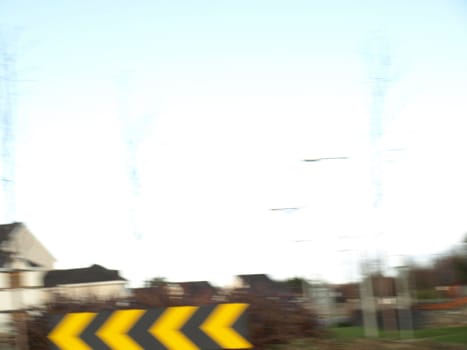 Speed: landscape with motion blur as seen from a running car, with copy space useful as a background