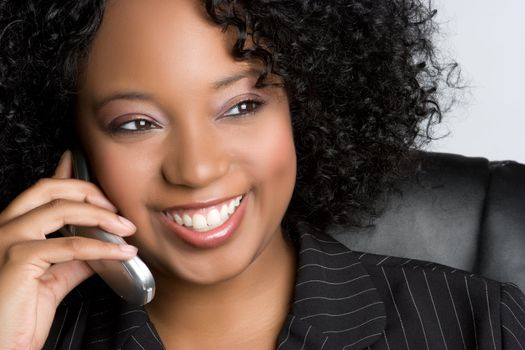 Smiling black cell phone woman