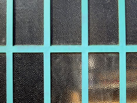 Detail of an old industrial window pane