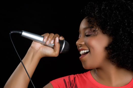 Beautiful black microphone singer woman