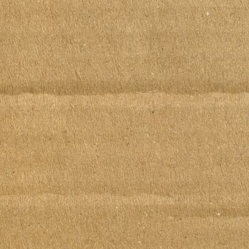 Brown corrugated cardboard sheet background material texture