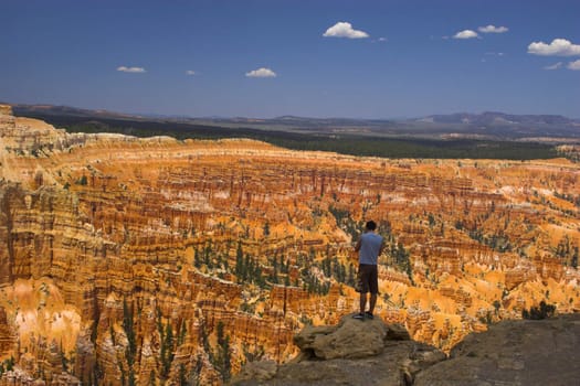 Tourists near rare rock formations of Bryce Canyon National park