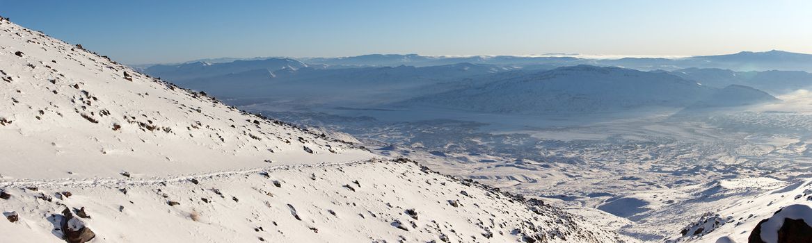 Panoramic winter image from Ararat slopes in the direction of Iran. Mount Ararat (Agri Dagi) is an inactive volcano located near Iranian and Armenian borders and the tallest peak in Turkey.