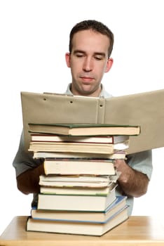 A student studying his notes from a binder, isolated against a white background