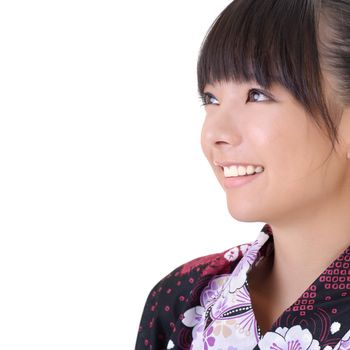 Closeup portrait of Japanese girl smiling face with copyspace on white.