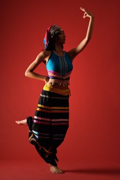 Mysterious traditional dancing of Chinese minority nationality girl.