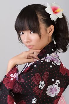 Mysterious Japanese woman with attractive face, closeup portrait.