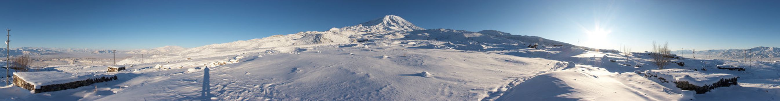 Mount Ararat (Agri Dagi) in winter. Panoramic image was shot from abandoned Elikoy village, altitude 2250m. Mount Ararat is an inactive volcano located near Iranian and Armenian borders and the tallest peak in Turkey.