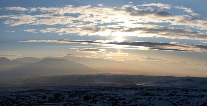 Winter sunset panoramic image from the valley to the south of Ararat. Mount Ararat (Agri Dagi) is an inactive volcano located near Iranian and Armenian borders and the tallest peak in Turkey.