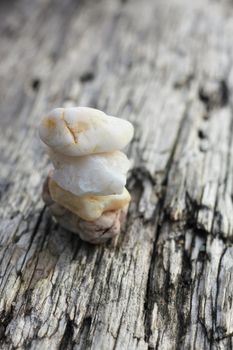 composition of small white rocks on an old lod