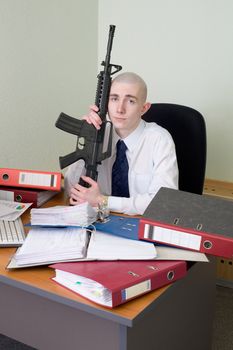 The chief accountant armed with a rifle