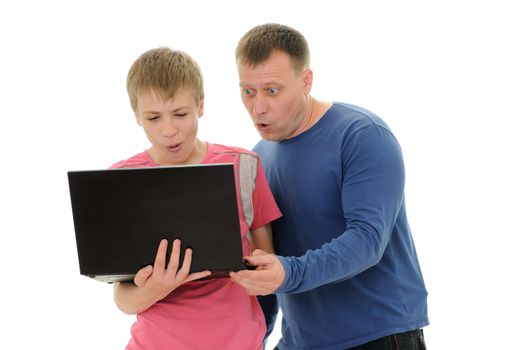 The father and the son look in laptop isolated on white background