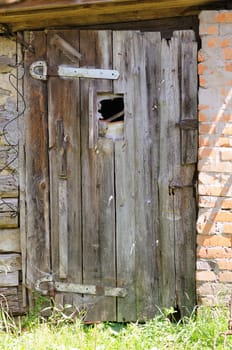 The old closed door in a shed