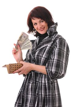The woman holds in hands a purse and money isolated on white background