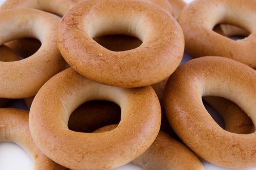 Pile of ring bagels as background