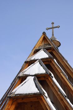 Roof of an orthodox in church in Mecavnik with sky in background.
