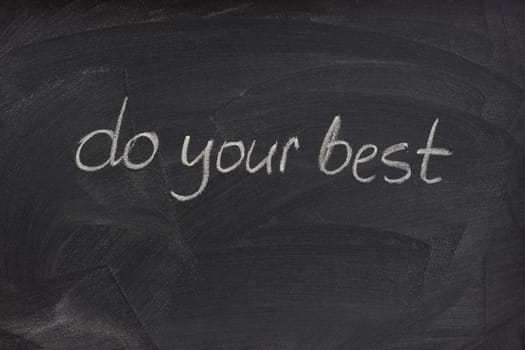 do your best - motivational phrase handwritten with white chalk on a blackboard with eraser smudge patterns