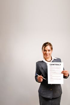 Business woman holding a printed contract