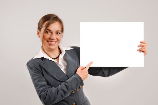 Business woman holding a large blank card