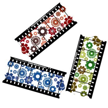 Gears on filmstrips in red, green and blue over white background