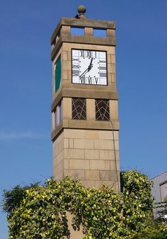 clock tower against a blue sky