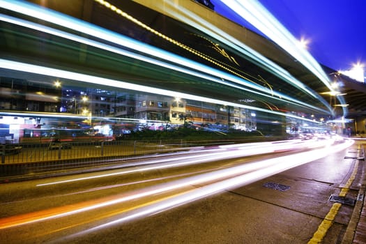 High traffic street in a rush-hour at night .