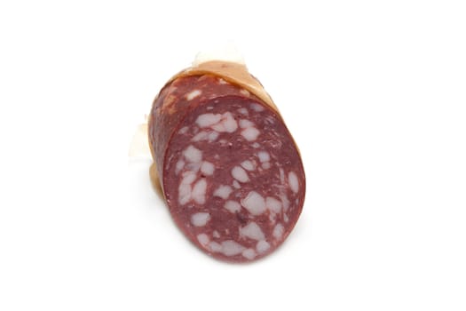 Piece of the cleaned sausage insulated on white background