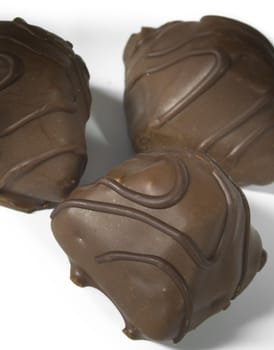 3 Sweet chocolate, a photo close up on a white background