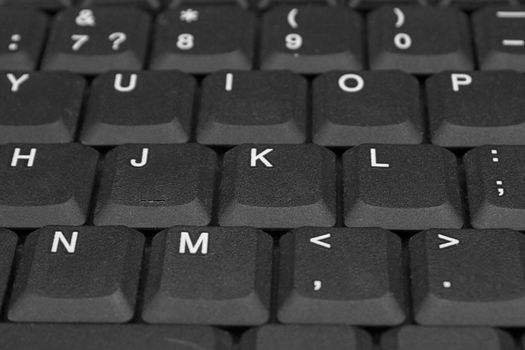 Black keys of the computer keyboard, photo close up