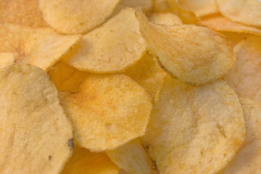 Appetizing potato chips, photo it is made by close up.