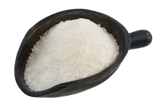 bright white powder (sweetener) on a rustic, wooden scoop isolated on white