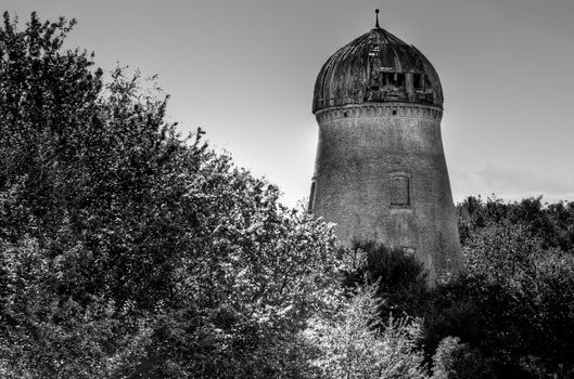 A Abandoned mill tower in black and white. HDRi version