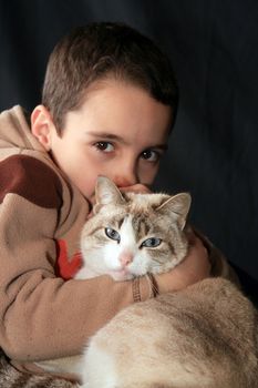 boy with beautiful firendly cat