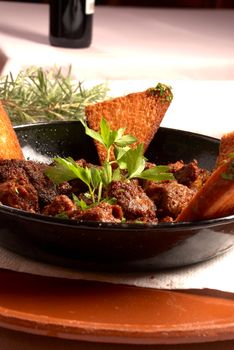 Hearty boar stew with herbs, Spanish cuisine