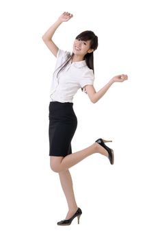 Dancing business woman with pleasure, full length portrait isolated on white.