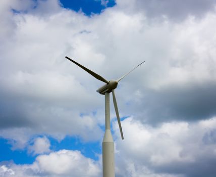 wind generator, on a background of blue sky