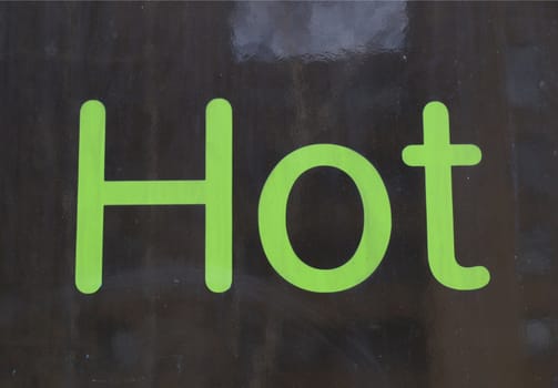 Word Hot written on a reflective surface