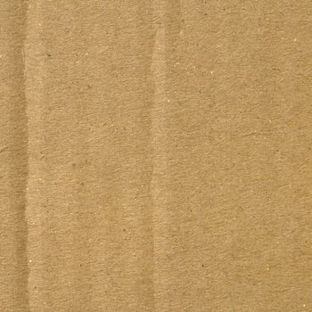 Brown corrugated cardboard sheet background material texture