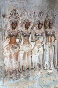 Ancient bas-relief at UNESCO's World Heritage Site of Angkor Wat, located at Siem Reap, Cambodia.