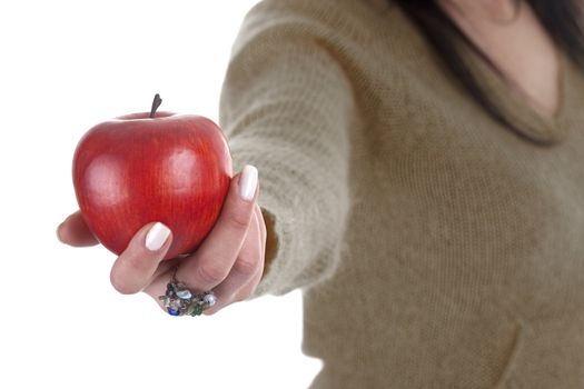 woman holding red apple isolated on white background - health and lifestyle concept