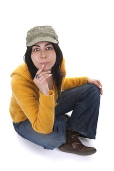 young casual woman with hat and yellow sweater - isolated on white background