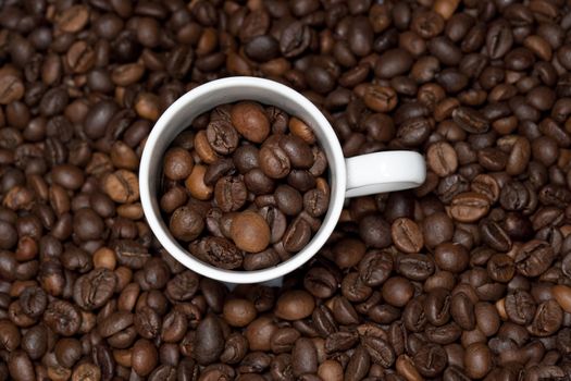 background with white cup and coffee beans - landscape orientation