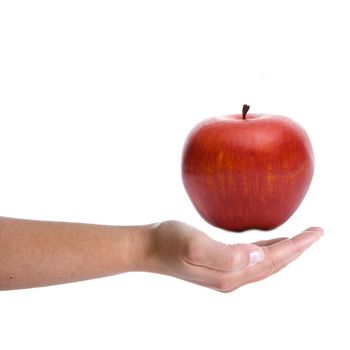 woman hand holding red apple isolated on white background