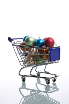 shopping cart full with christmas balls